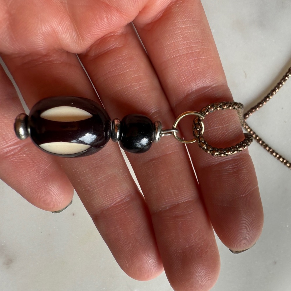 Vintage pendant Charm glass stone bead Black and beige with gold chain Necklace